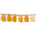 10x8-12.5x8.5mm Aragonite faceted tear drop beads 8 inch 23 pieces