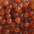 7mm Carnelian faceted round Black Gold .925 Silver Chain by the foot 24 pieces