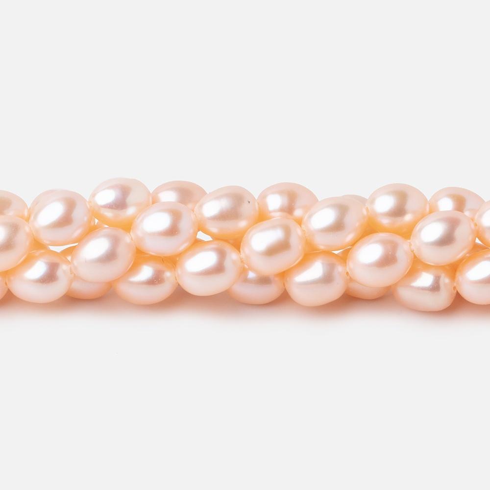 7x5mm Peach Straight Drill Oval Freshwater Pearl 15 inch 56 pcs