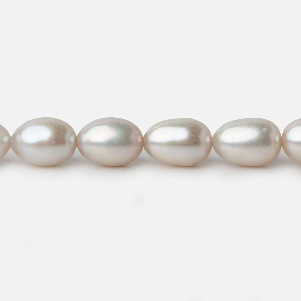 7x9-7x10mm Silver Champagne Straight Drill Oval Freshwater Pearl 16 inch 40 pieces A