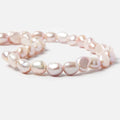 9.5x8-11x9.5mm Iced Pink Baroque 2.5mm large hole Pearls 15 in. 39 pcs